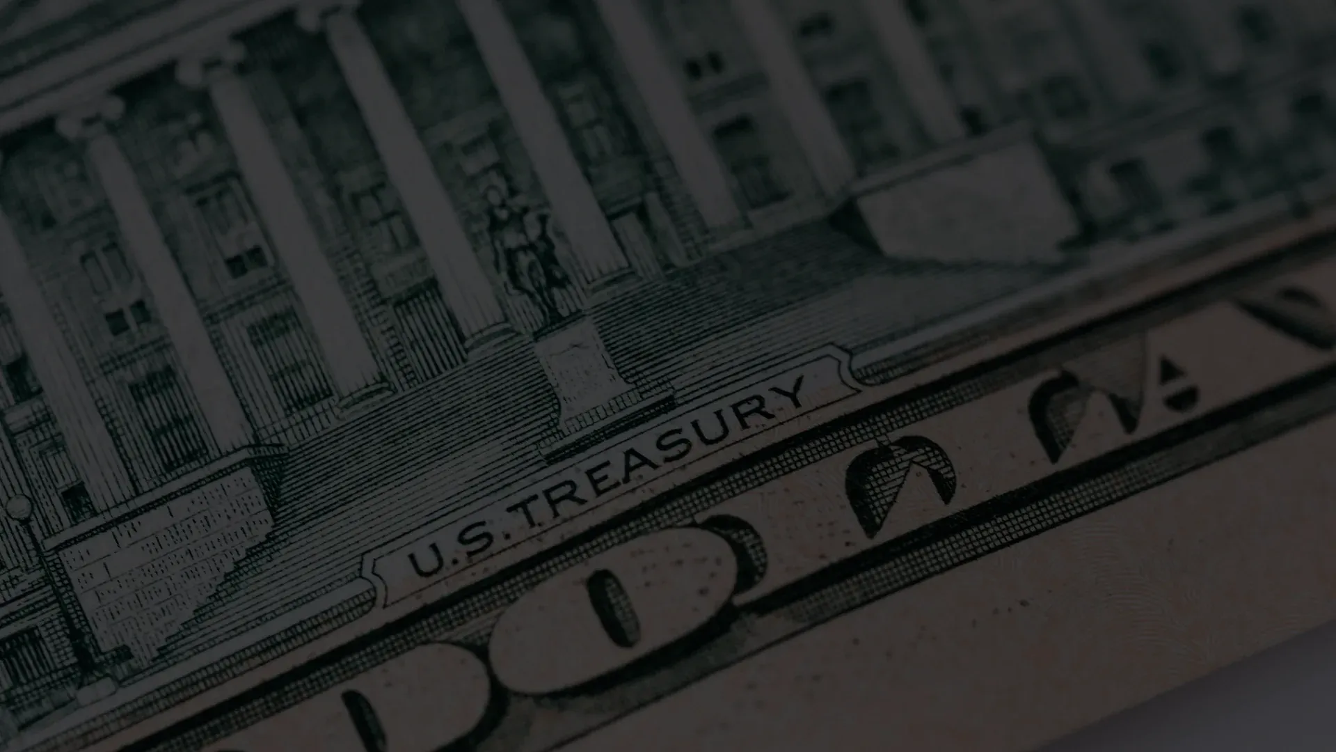 Close-up of the U.S. Treasury building engraving on the back of a ten-dollar bill